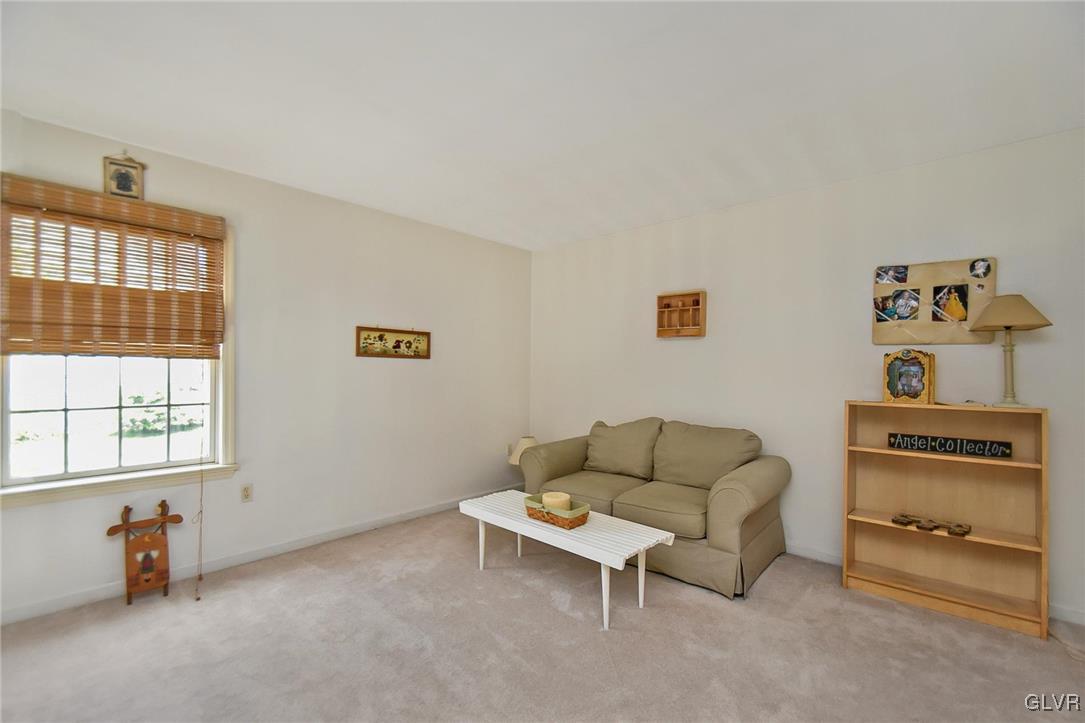 105 Hahn Road Stroudsburg, PA 18360 - Photo 25 of 45 a living room with furniture and a window