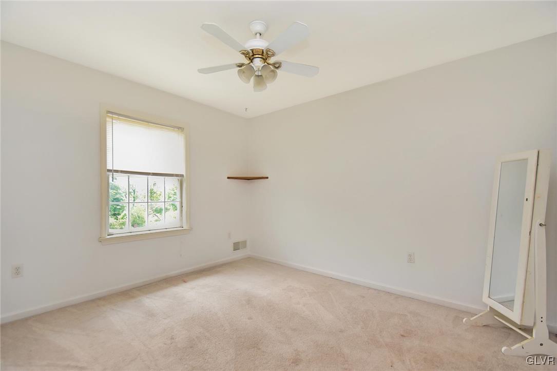 105 Hahn Road Stroudsburg, PA 18360 - Photo 28 of 45 an empty room with a window and a fan
