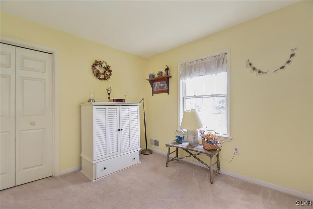 105 Hahn Road Stroudsburg, PA 18360 - Photo 30 of 45 a living room with furniture and a window