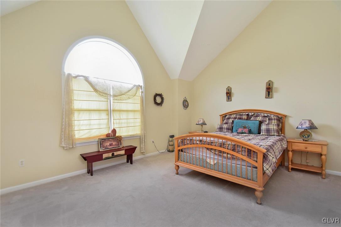 105 Hahn Road Stroudsburg, PA 18360 - Photo 33 of 45 a bedroom with a bed and a large window