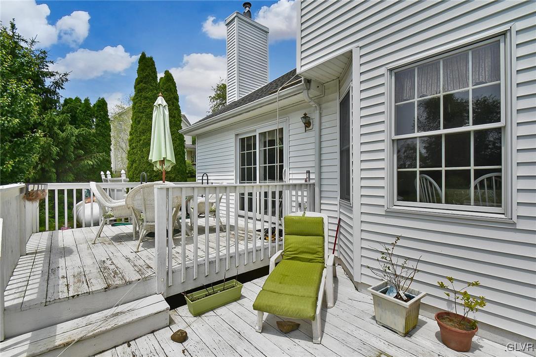 105 Hahn Road Stroudsburg, PA 18360 - Photo 38 of 45 a view of a deck with couches chairs and wooden fence