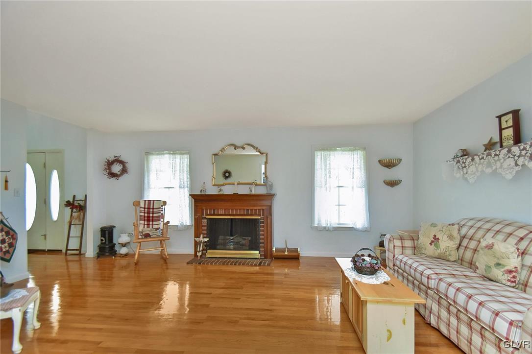 105 Hahn Road Stroudsburg, PA 18360 - Photo 7 of 45 a living room with furniture and a fireplace