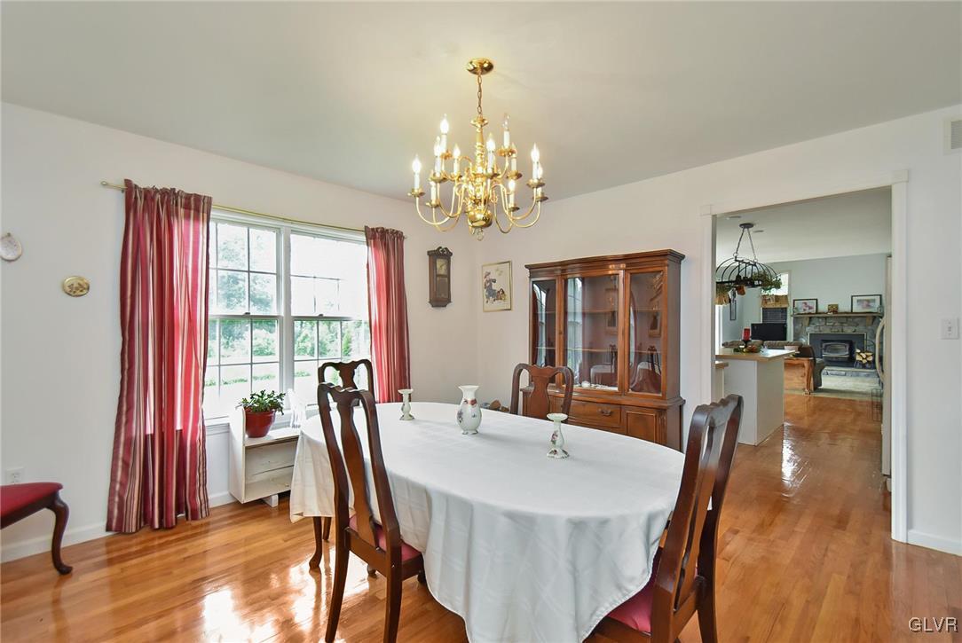 105 Hahn Road Stroudsburg, PA 18360 - Photo 10 of 45 a view of a dining room with furniture window and wooden floor