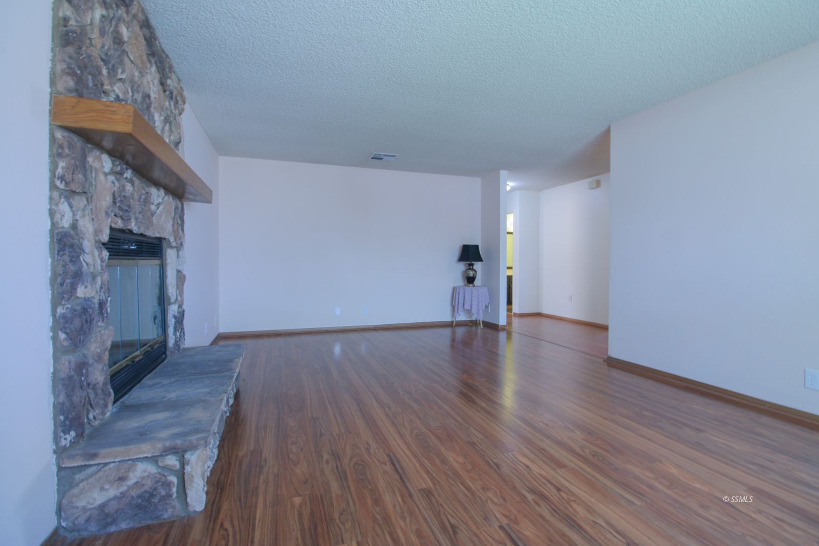 609 South Appaloosa Street Ridgecrest, CA 93555 - Photo 8 of 44 a view of empty room with wooden floor