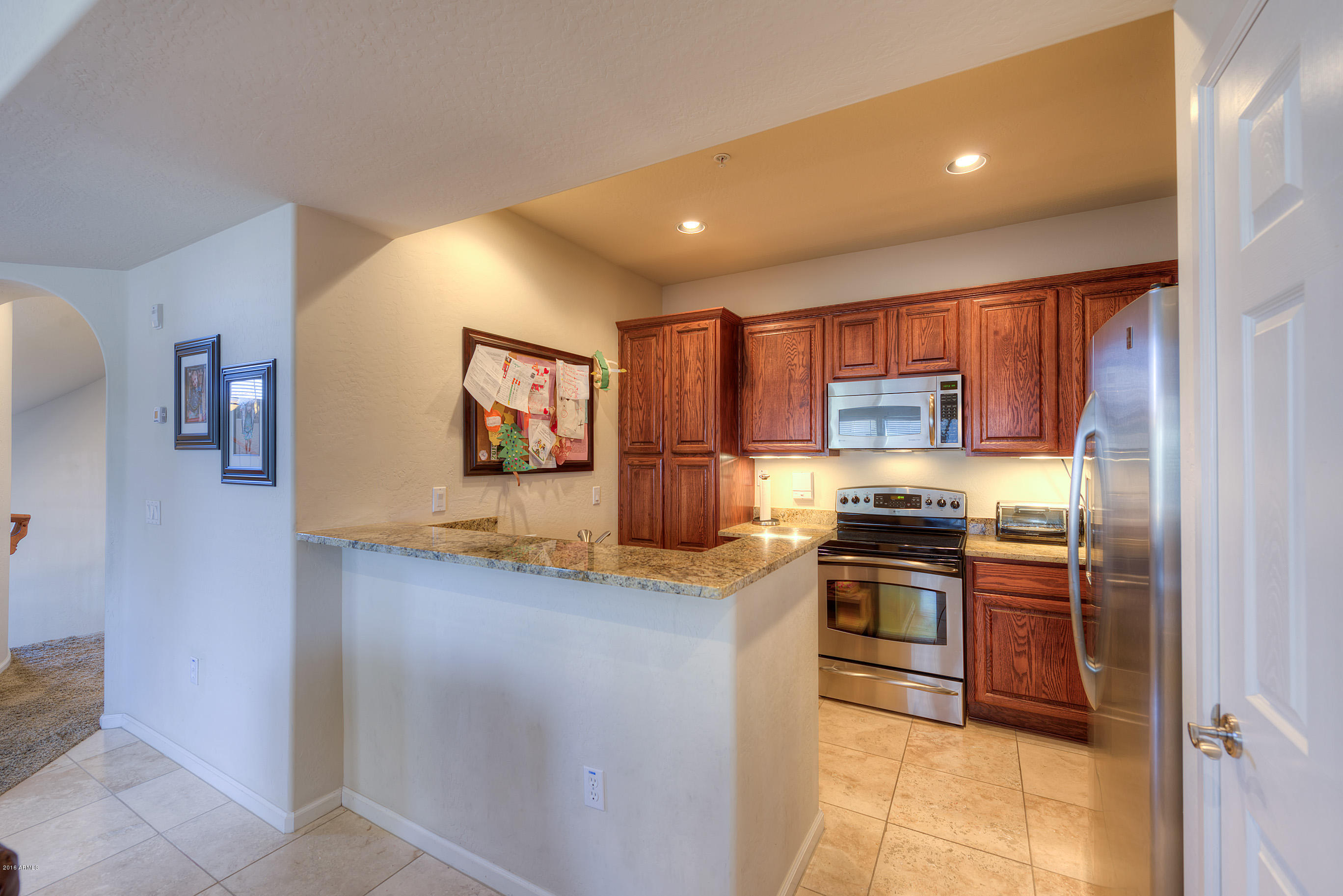 3935 East Rough Rider Road, Unit 1196 Phoenix, AZ 85050 - Photo 8 of 14 008_Kitchen