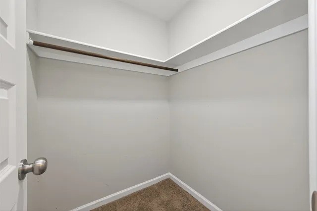 a view of small space with racks on the wall