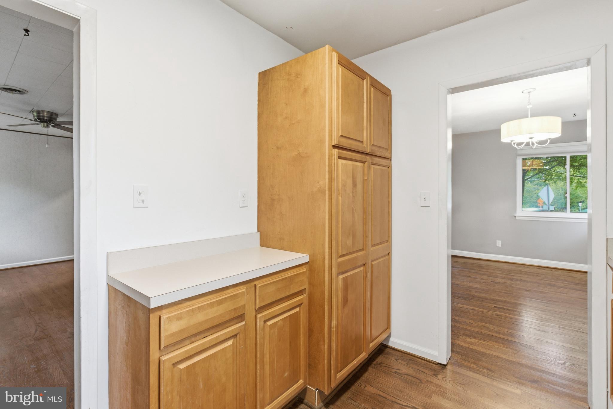 6801 Adelphi Road University Park, MD 20782 - Photo 8 of 26 Additional counter space & storage in the kitchen.