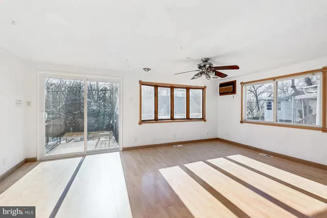 a view of a room with a large window