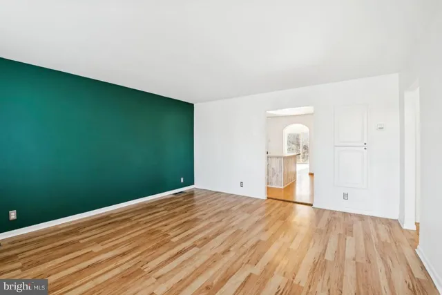 a view of a big room with wooden floor