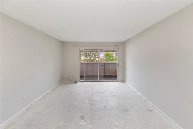 a view of a kitchen with a sink