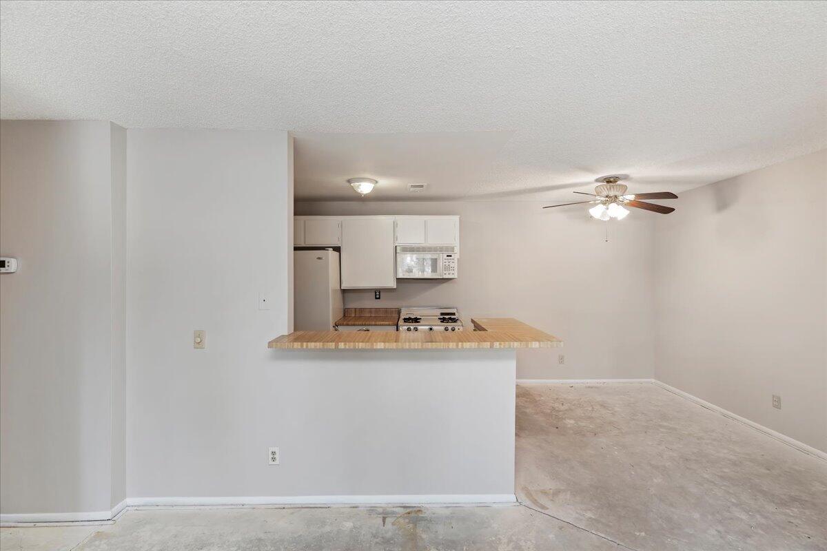 26200 Redlands Boulevard, Unit 68 Redlands, CA 92373 - Photo 14 of 32 a view of a kitchen with a sink