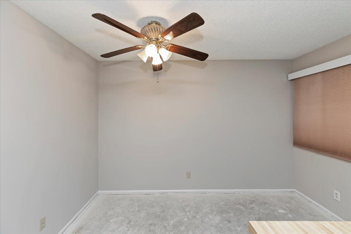 26200 Redlands Boulevard, Unit 68 Redlands, CA 92373 - Photo 16 of 32 an empty room with a window and a fan