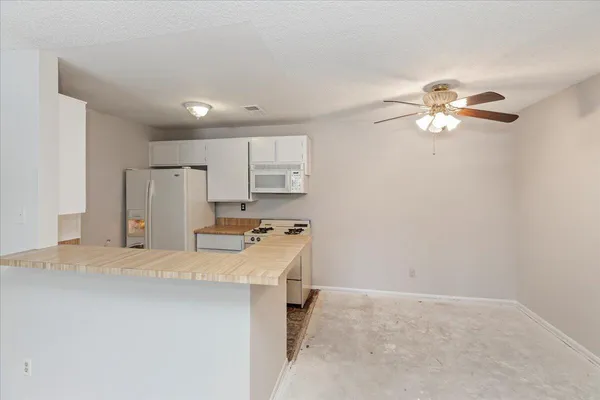 a room with furniture a table and chair