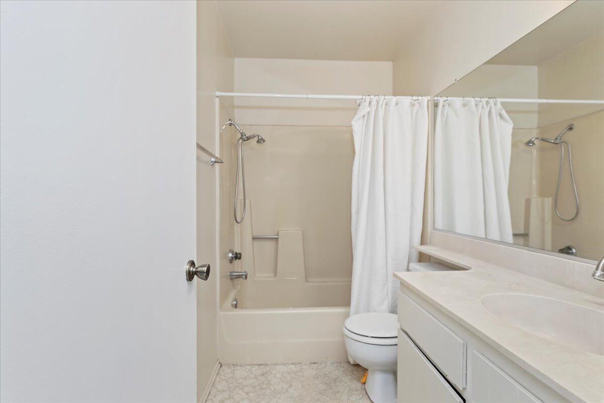 26200 Redlands Boulevard, Unit 68 Redlands, CA 92373 - Photo 23 of 32 a bathroom with a sink a toilet and shower