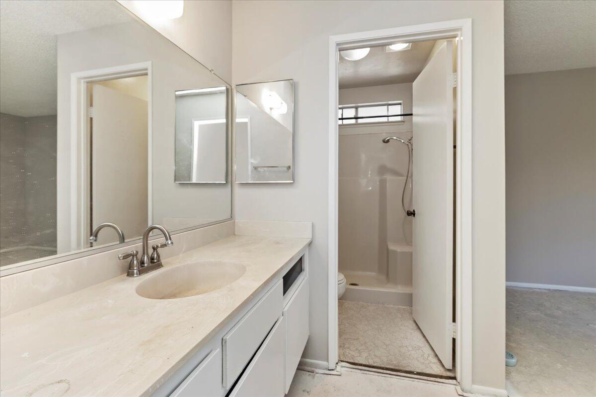 26200 Redlands Boulevard, Unit 68 Redlands, CA 92373 - Photo 24 of 32 a bathroom with a sink and a mirror