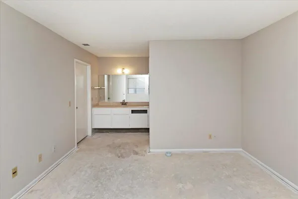 a white toilet sitting next to a bath tub shower