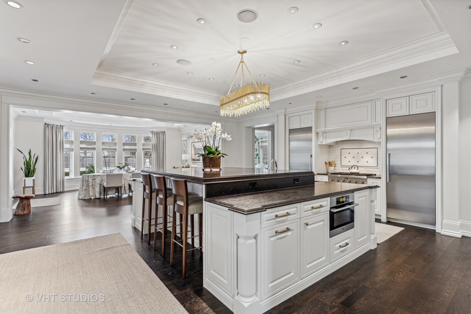 375 Old Farm Road Northfield, IL 60093 - Photo 15 of 78 a kitchen with stove a sink dishwasher a refrigerator and white cabinets with wooden floor