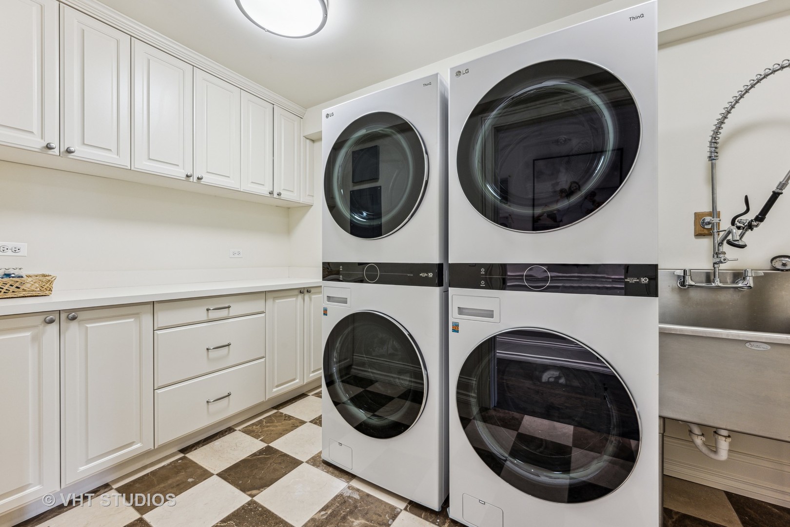 375 Old Farm Road Northfield, IL 60093 - Photo 49 of 78 a view of a storage and utility room with washer and dryer