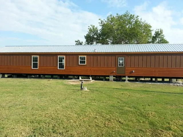 a view of a backyard with a garden