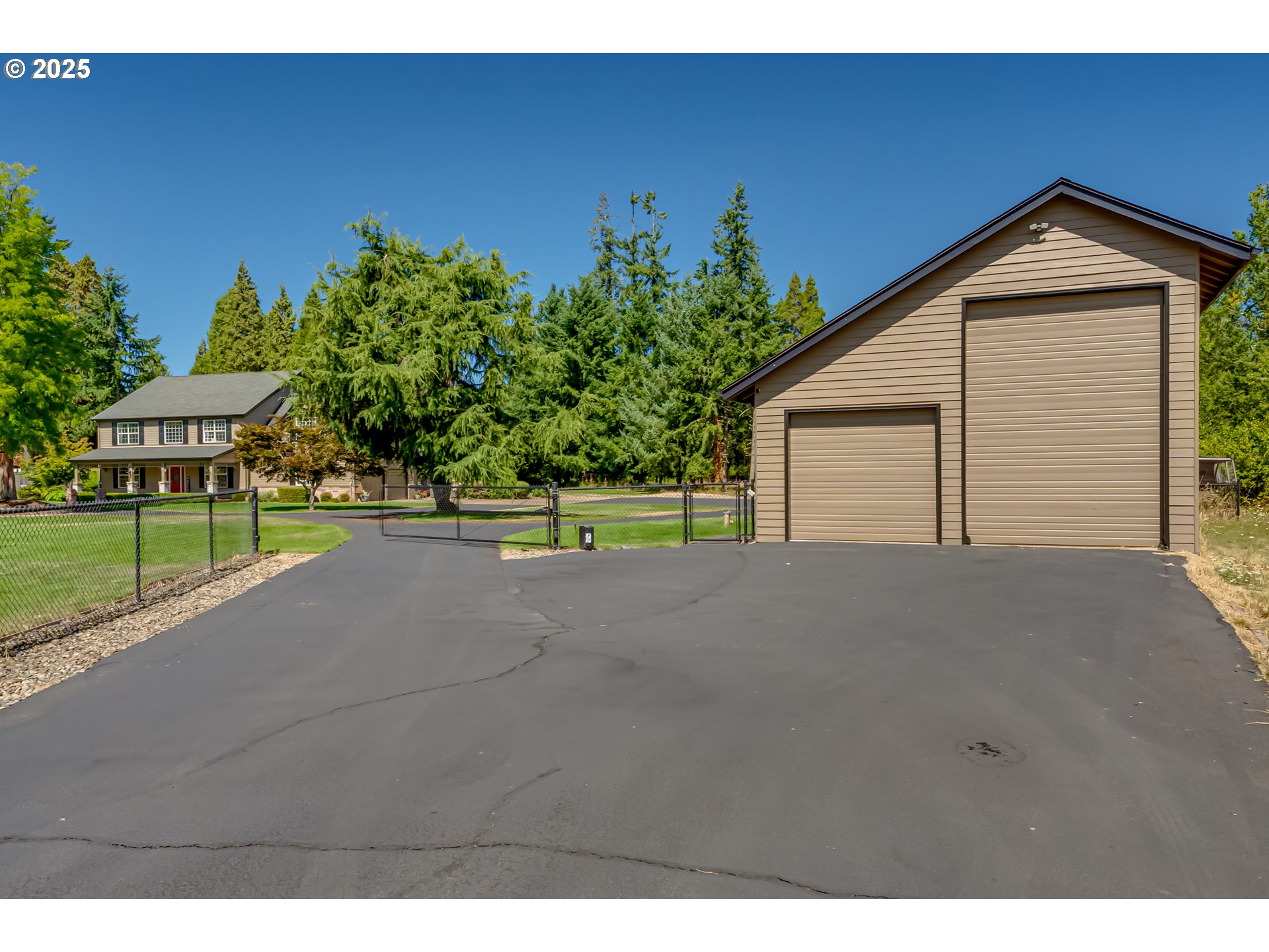 39125 Easton Lane Springfield, OR 97478 - Photo 3 of 47 a view of a house with a yard and potted plants