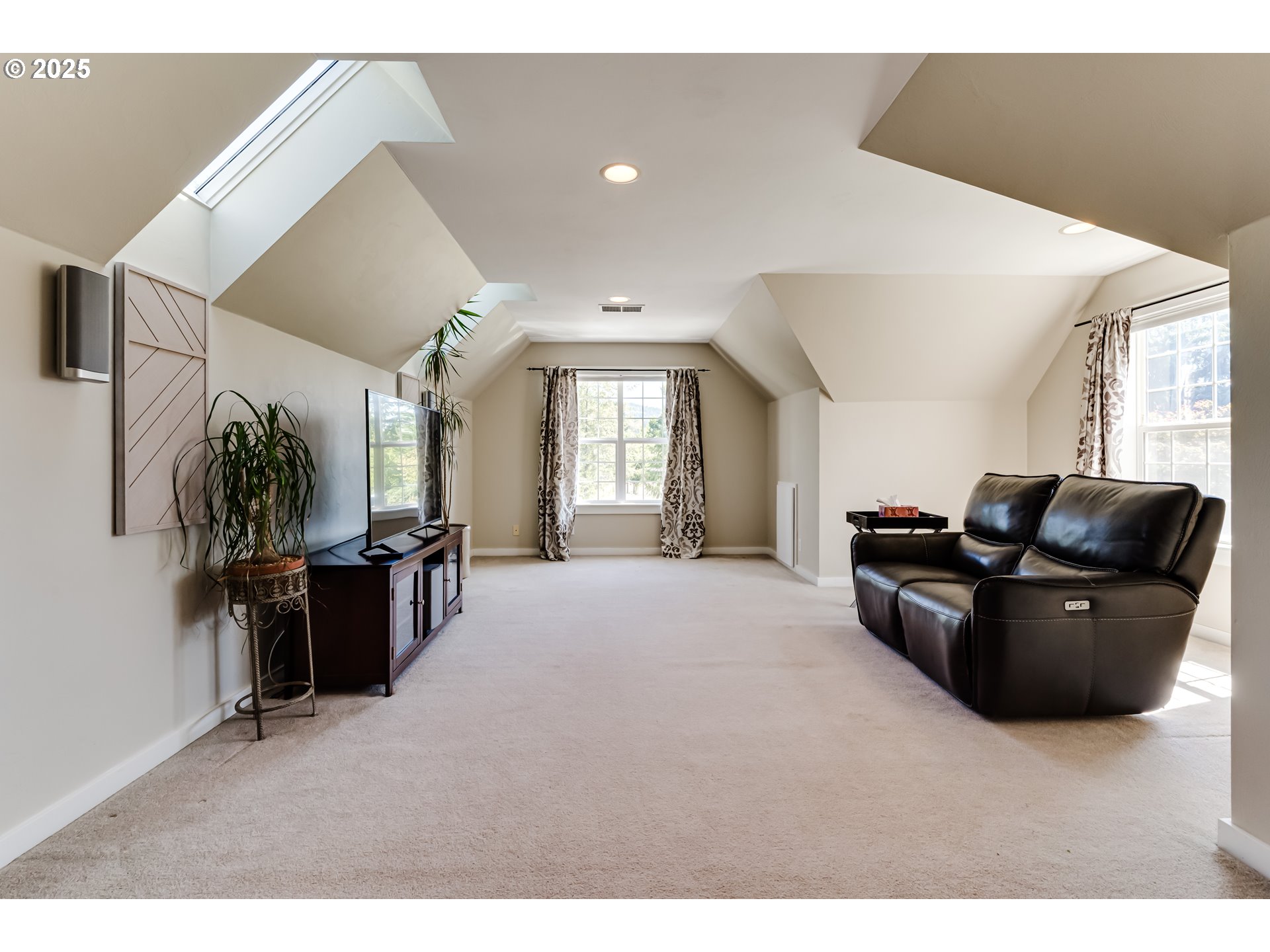 39125 Easton Lane Springfield, OR 97478 - Photo 31 of 47 a living room with furniture and a flat screen tv