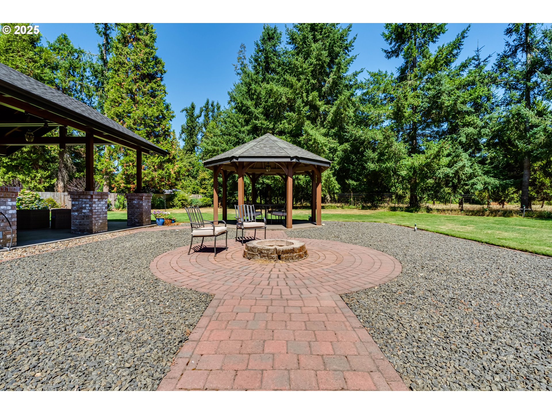39125 Easton Lane Springfield, OR 97478 - Photo 39 of 47 a view of outdoor space yard deck patio and outdoor kitchen