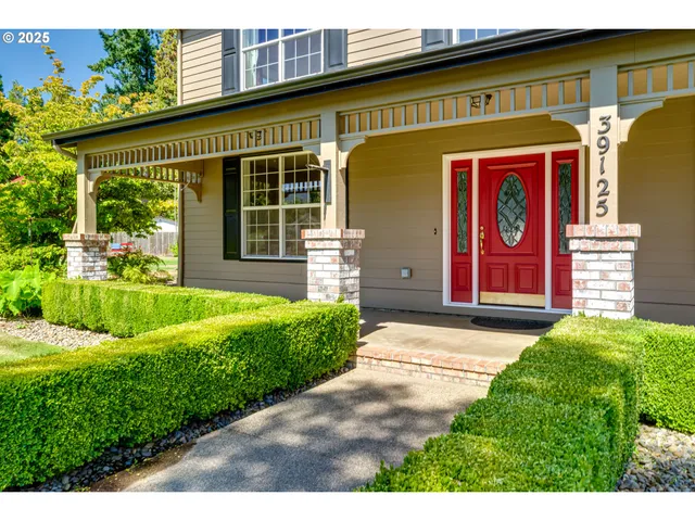 a front view of a house with garden