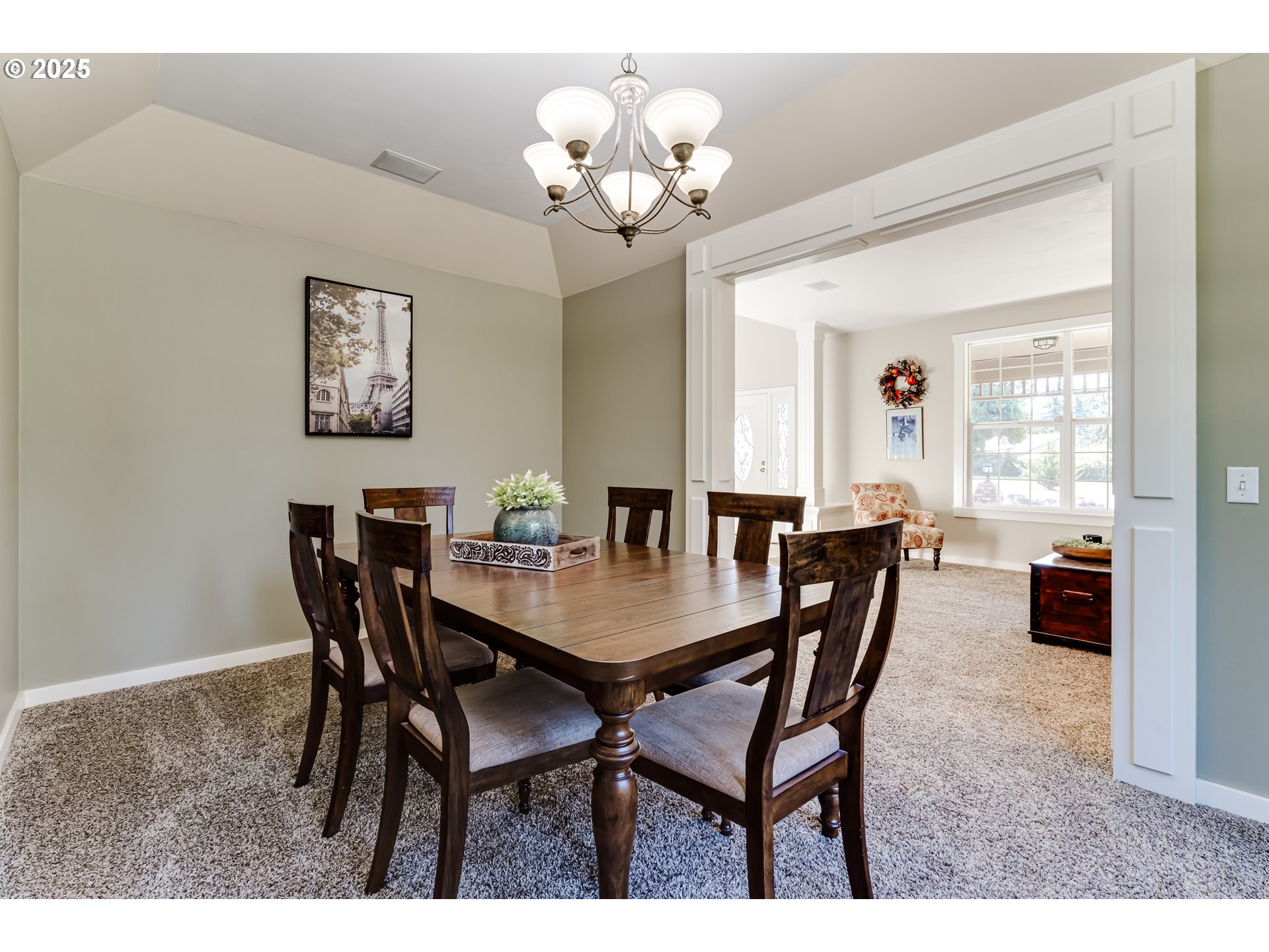 39125 Easton Lane Springfield, OR 97478 - Photo 10 of 47 a view of a dining room with furniture and chandelier