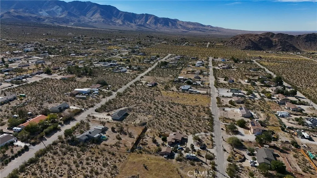 781 Zircon Road Lucerne Valley, CA 92356 - Photo 4 of 9 a view of a city with mountains in the background