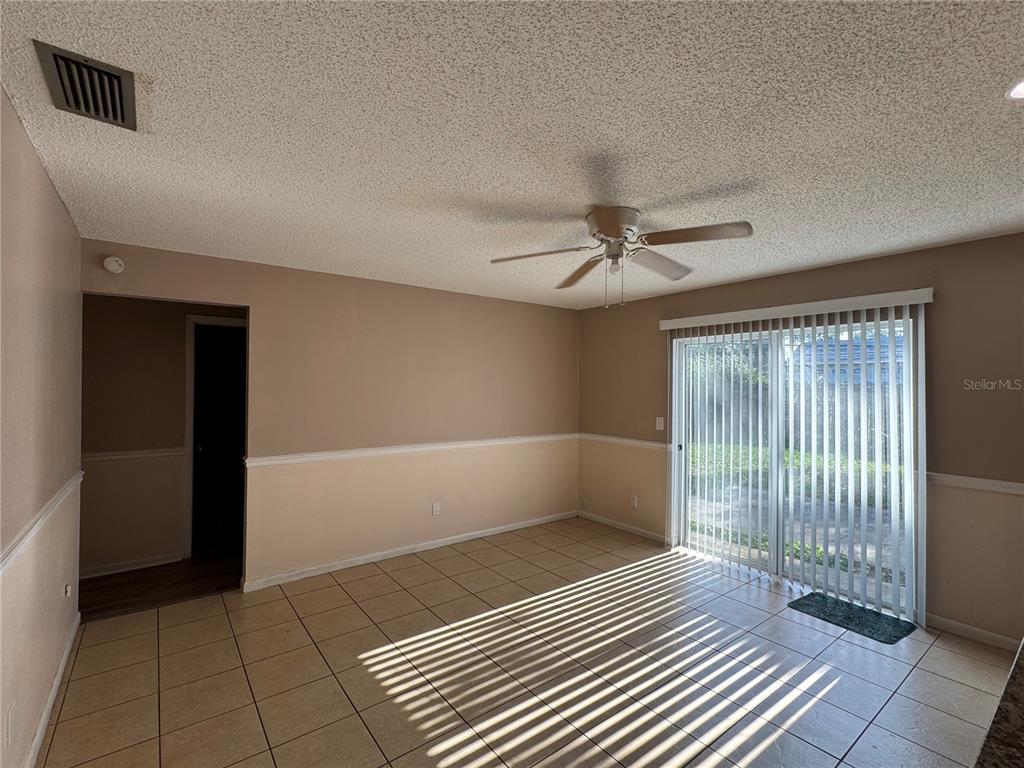 1703 North Taylor Road Brandon, FL 33510 - Photo 23 of 32 a view of a livingroom with a staircase
