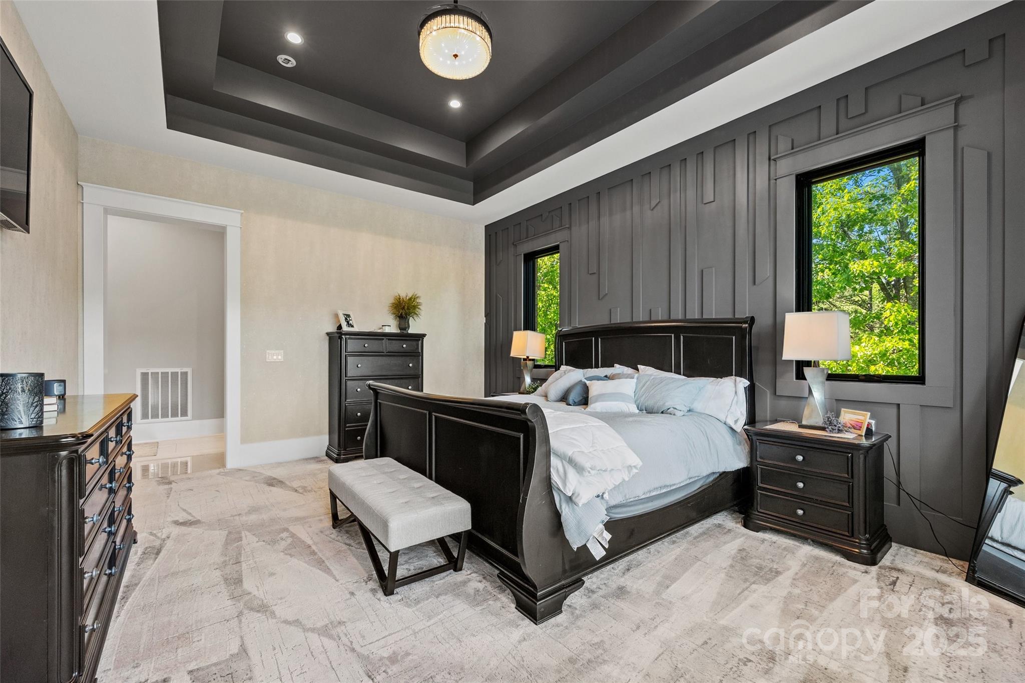 385 Squirrel Lane Lake Wylie, SC 29710 - Photo 16 of 48 a bed room with a bed window and mirror