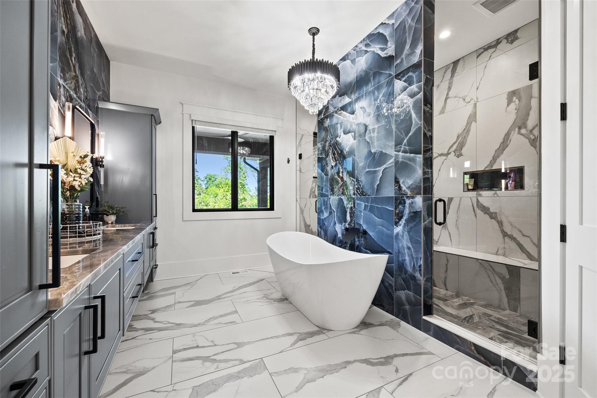 385 Squirrel Lane Lake Wylie, SC 29710 - Photo 17 of 48 a spacious bathroom with a bathtub and a shower