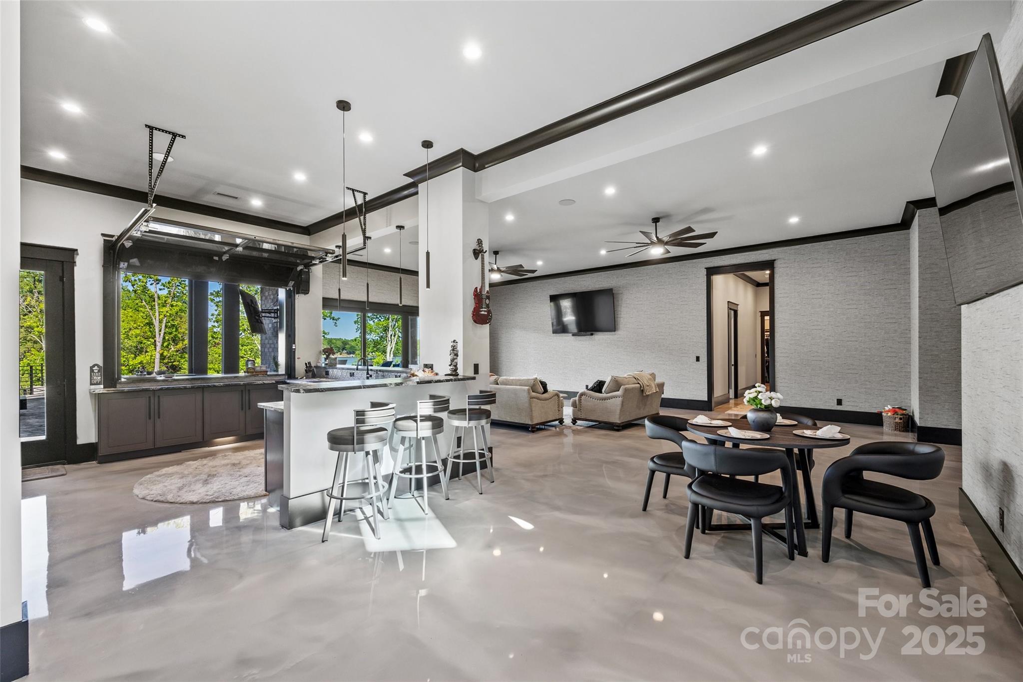 385 Squirrel Lane Lake Wylie, SC 29710 - Photo 29 of 48 a view of a big dining room with furniture
