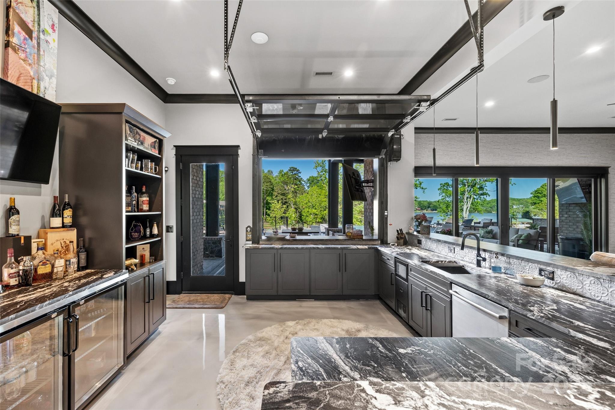 385 Squirrel Lane Lake Wylie, SC 29710 - Photo 30 of 48 a large kitchen with a large window and stainless steel appliances