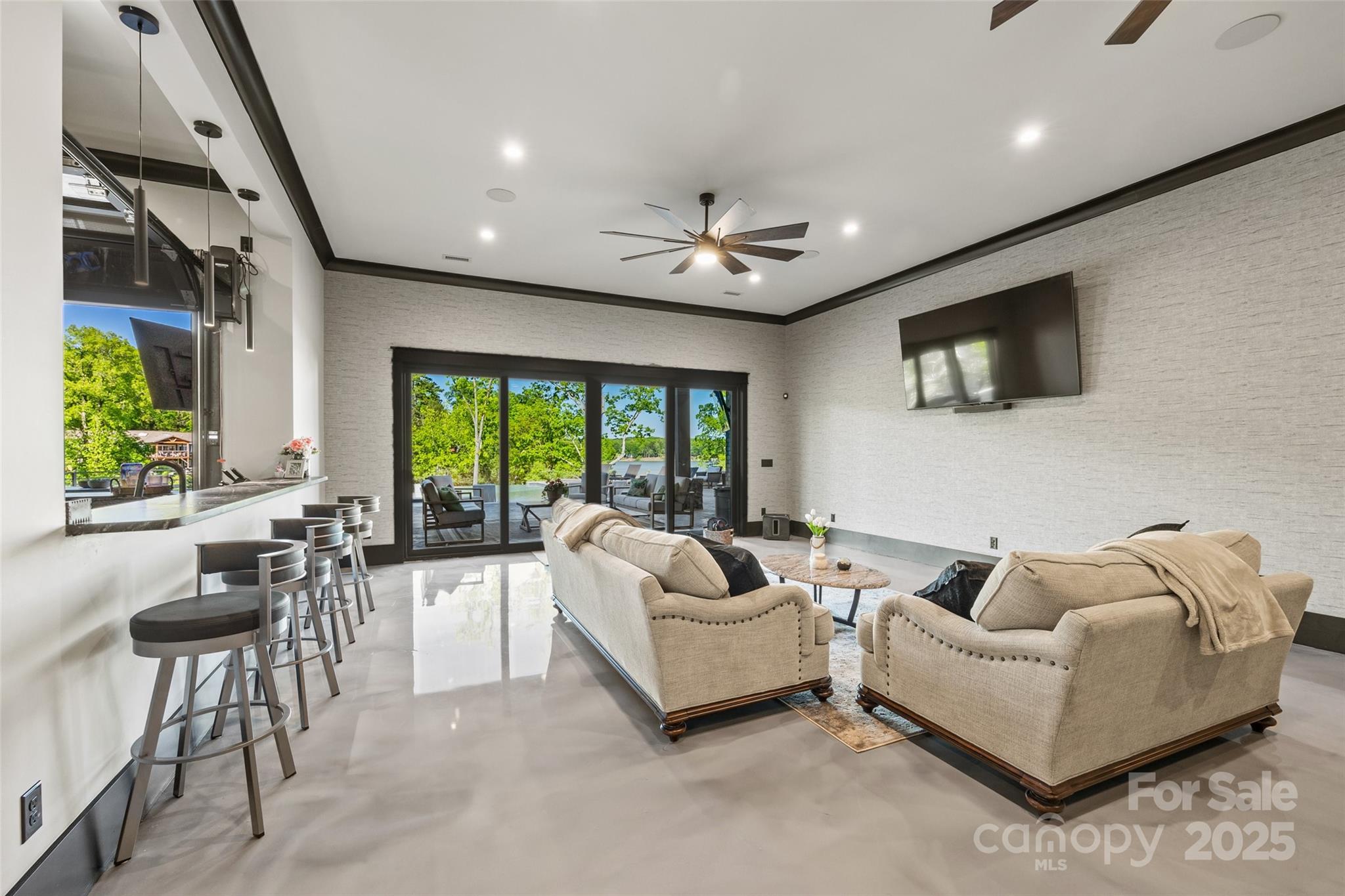 385 Squirrel Lane Lake Wylie, SC 29710 - Photo 33 of 48 a living room with furniture and a flat screen tv
