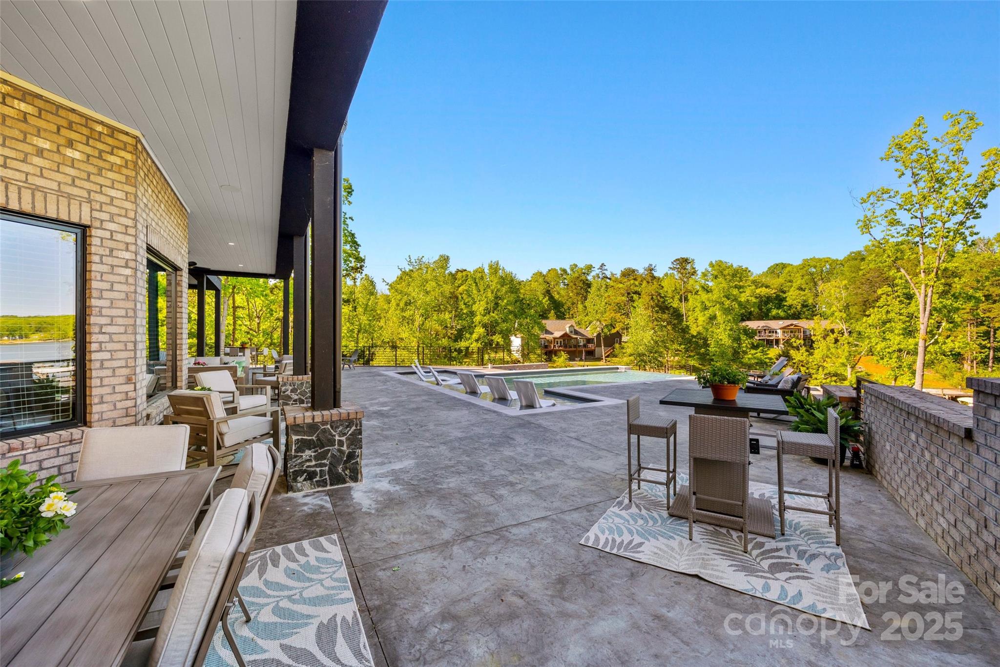 385 Squirrel Lane Lake Wylie, SC 29710 - Photo 37 of 48 a view of a chairs and table in patio