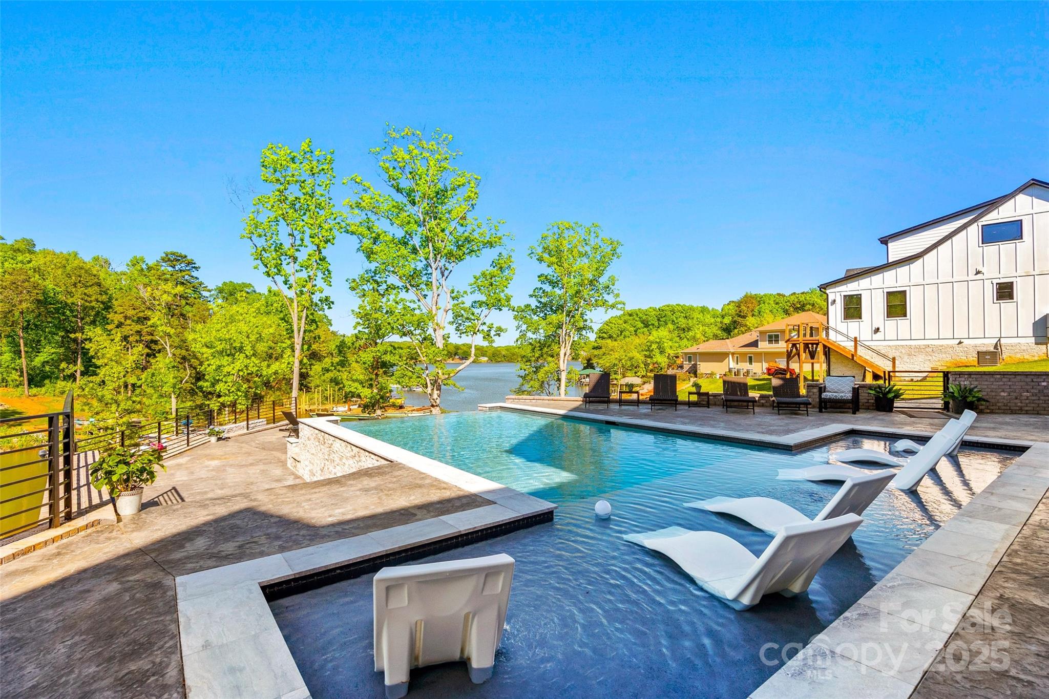 385 Squirrel Lane Lake Wylie, SC 29710 - Photo 39 of 48 a view of a swimming pool with furniture