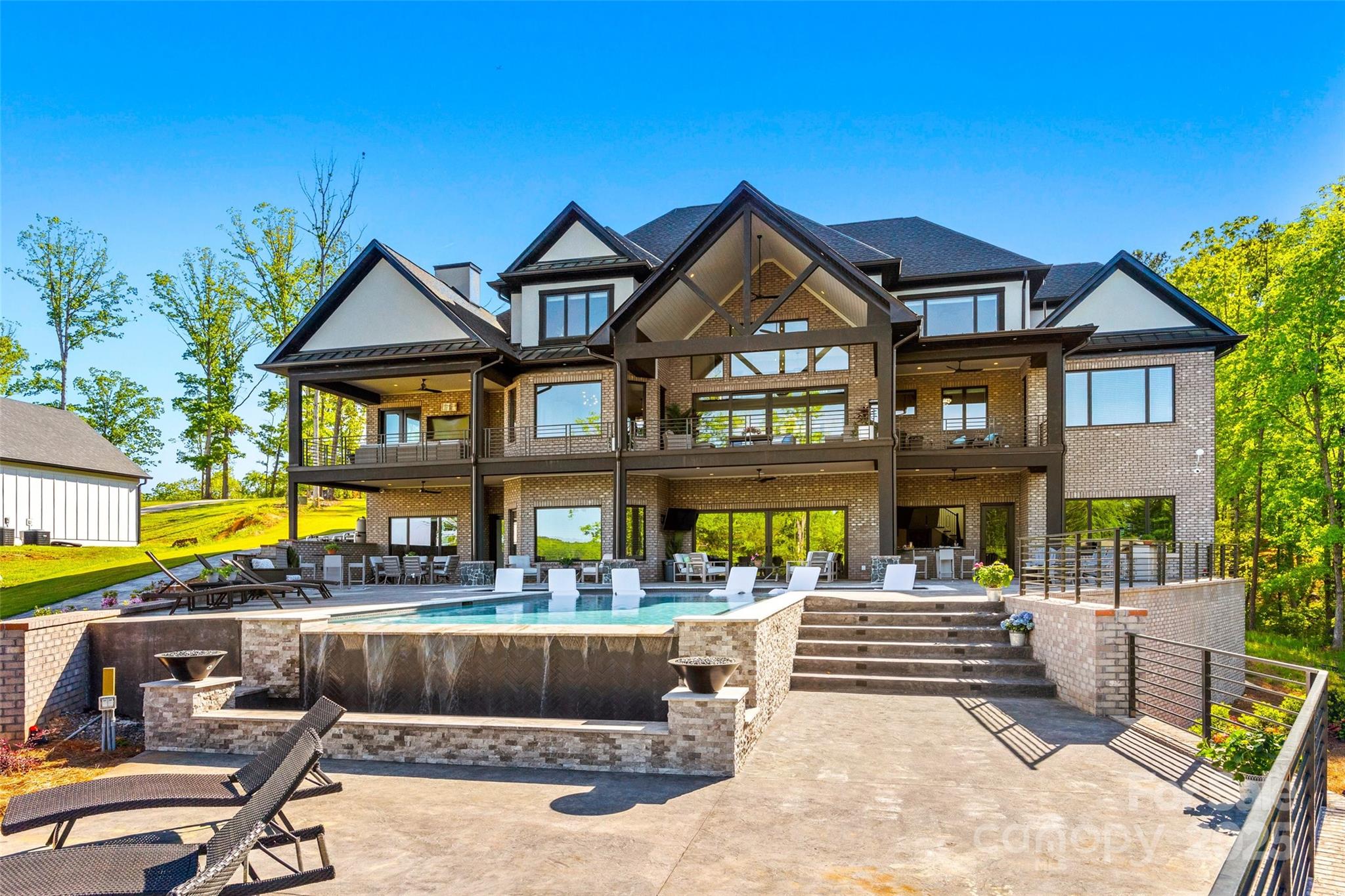 385 Squirrel Lane Lake Wylie, SC 29710 - Photo 41 of 48 a view of a building with a swimming pool