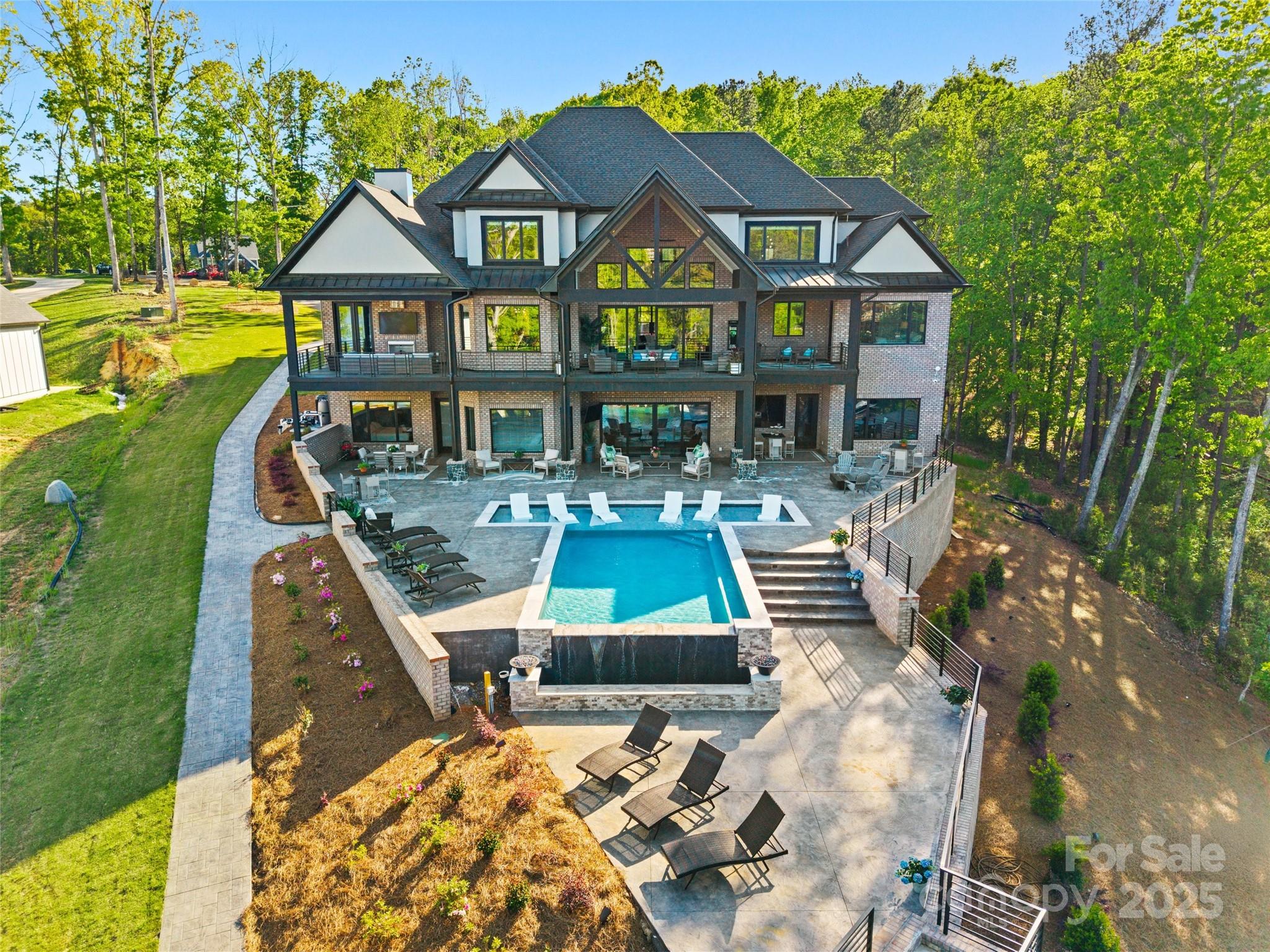 385 Squirrel Lane Lake Wylie, SC 29710 - Photo 42 of 48 a front view of a house with swimming pool