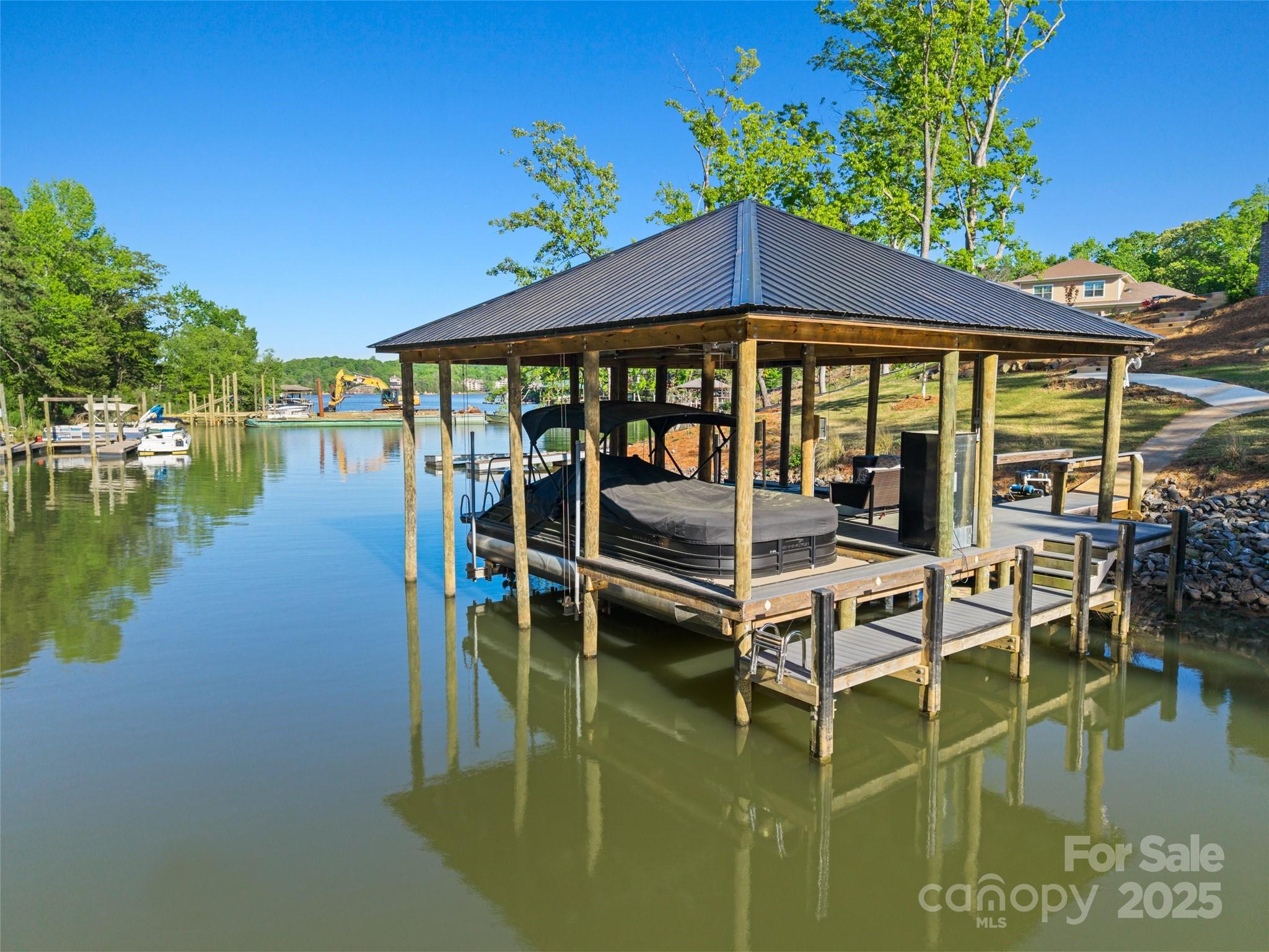 385 Squirrel Lane Lake Wylie, SC 29710 - Photo 44 of 48 a small pool with table and chairs