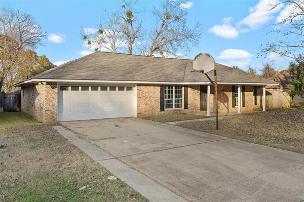 front view of a house with a dry yard