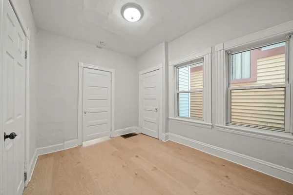 an empty room with windows