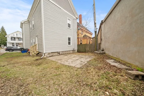 a view of a yard in front of a house