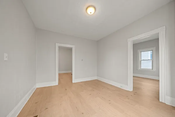 wooden floor and window in a room