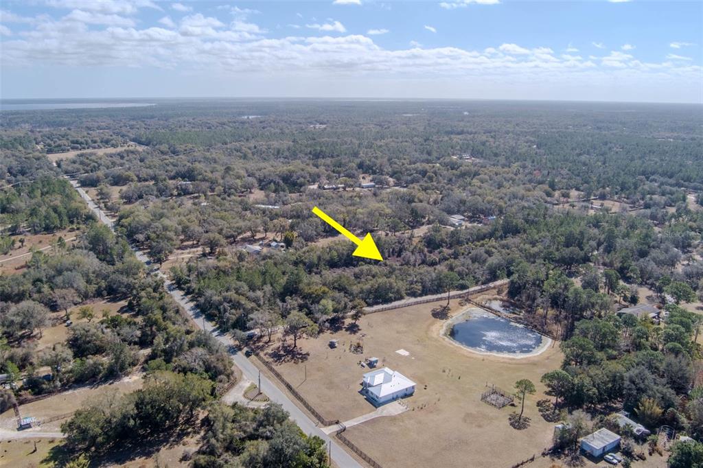 Cochran Road Geneva, FL 32732 - Photo 20 of 28 an aerial view of a house with yard and mountain view in back