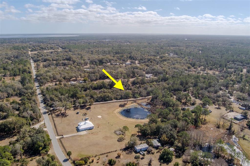 Cochran Road Geneva, FL 32732 - Photo 5 of 28 an aerial view of a house with a swimming pool yard and mountain view in back