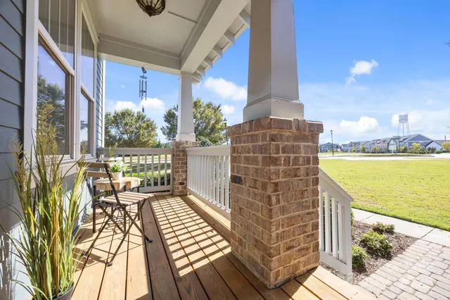 a view of a room with outdoor seating