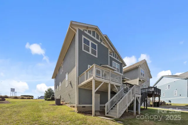 a view of a big building next to a yard