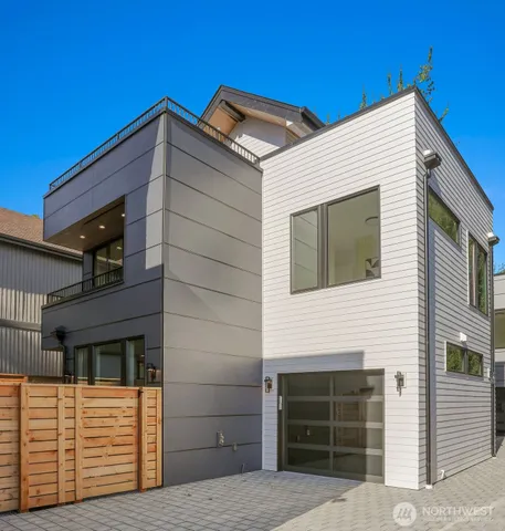 a front view of a house with a garage