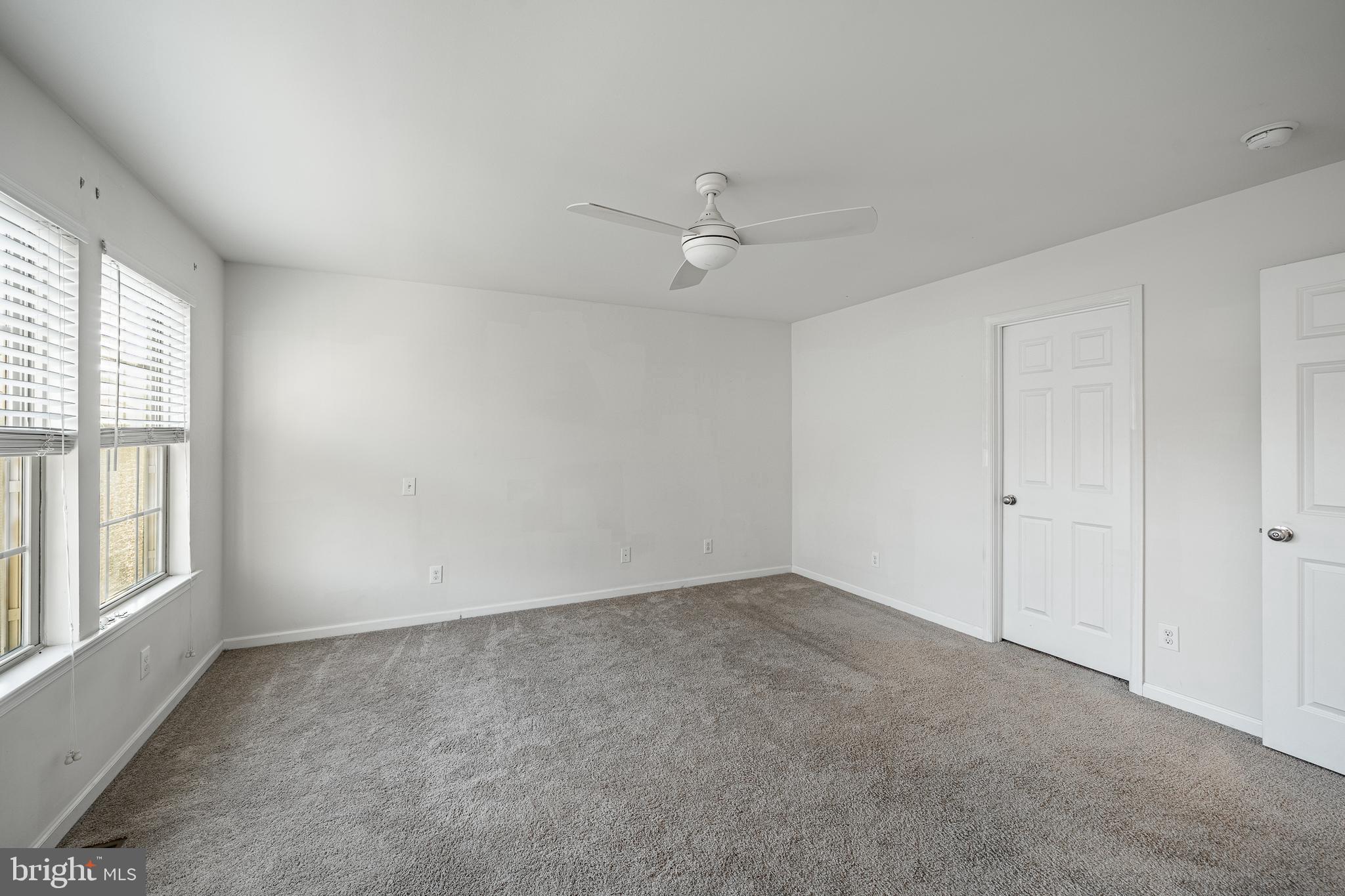 33 Addison Lane Malvern, PA 19355 - Photo 23 of 32 wooden floor in an empty room with a window